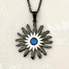Colgante Eguzkilore Laztanak Negro con Circonita Azul - Imagen 3